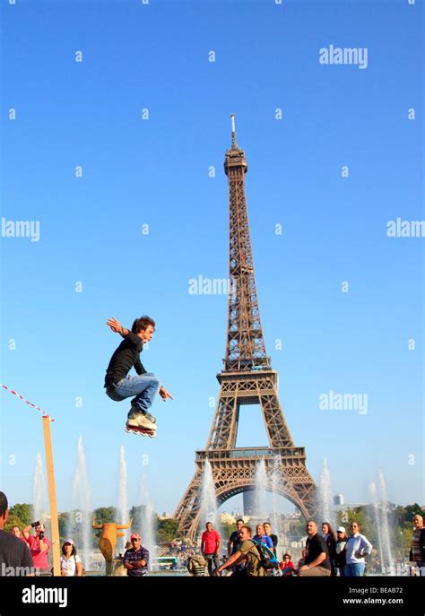 Roller Skater jumping in front of the Eiffel Tower Paris Stock Photo - Alamy