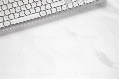 White computer keyboard, office background 21701294 Stock Photo at Vecteezy