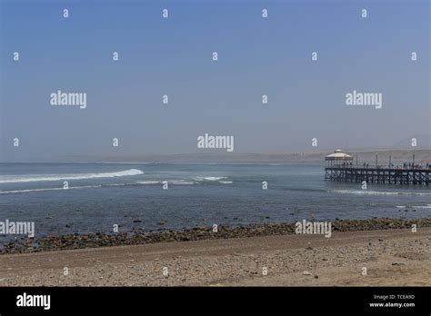 surfing beach with pier in huanchaco, peru Stock Photo - Alamy