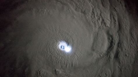 The electric eye of a cyclone, viewed from space - CNET