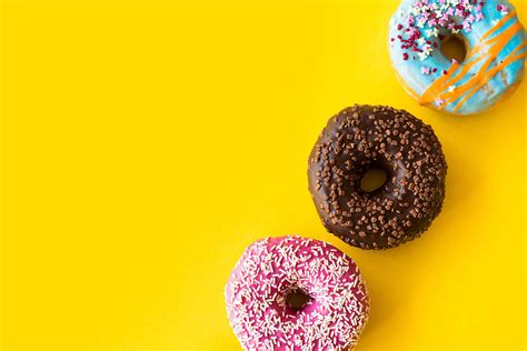 Yummy Donuts on Yellow Background Free Stock Photo | picjumbo