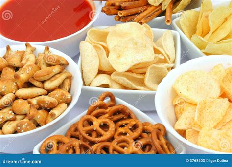 Potato chips and snacks stock image. Image of salt, salted - 3768503