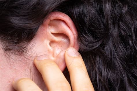 What you need to know about ear pimples | Curology