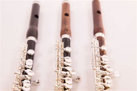 Close-Up Photograph of Piccolo Flutes on a White Surface · Free Stock Photo