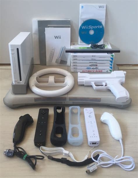 Nintendo - Wii console & accessories + 7 games - Catawiki