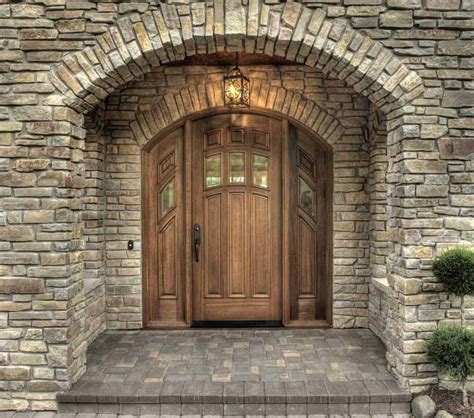 light stone double gable arch over front door brown shutters - Google ...