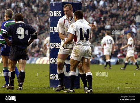 Jason Robinson celebrates one of his trys against Scotland during the ...