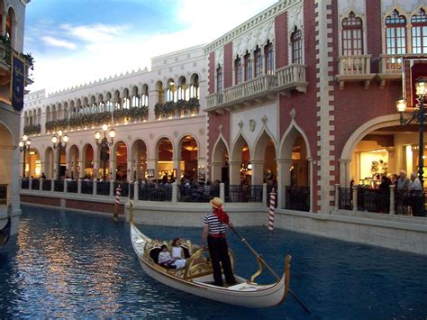 Venetian Gondola Ride Photograph by Peggy Leyva Conley