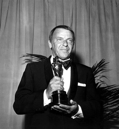 Frank Sinatra holding an Oscar trophy Photo Print - Walmart.com