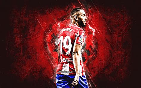 Matheus Cunha, Atletico Madrid, Brazilian soccer player, red stone background, La Liga, Spain ...