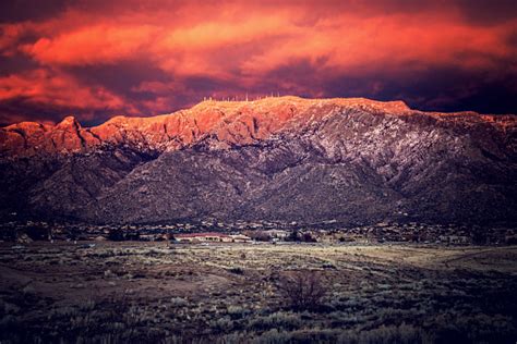 Snow Dusted Sandia Mountains At Magic Hour Stock Photo - Download Image Now - iStock