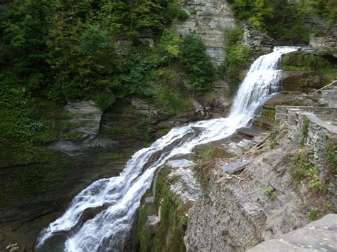 there is a large waterfall in the woods