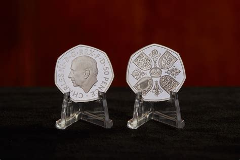 Royal Mint releases new £5 and 50p coins with King Charles' effigy - CityAM