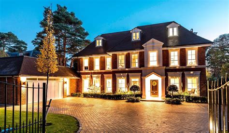 There's bags of luxurious entertaining space at this six-bedroom home on a prestigious Surrey ...