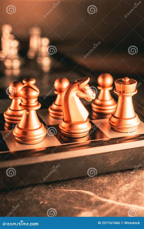 Closeup of Gold Metallic Chess Pieces on a Board Stock Photo - Image of ...