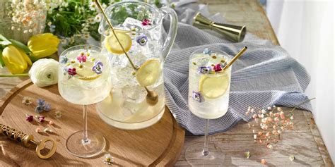 This gin, sparkling white wine and elderflower syrup punch recipe is spring in a glass - YUM ...