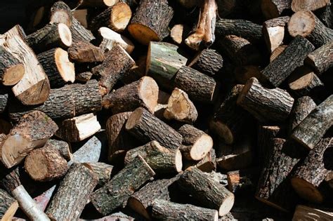 Premium Photo | Logs for firewood cut a stack of logs stack of firewood