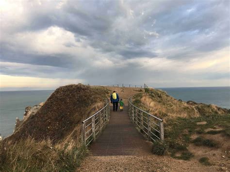 See the White Chalk Cliffs and Arches at Étretat Normandy Coast • Tapped Out Travellers