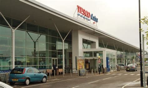 An outbreak of coronavirus at a Dundee Tesco store has been confirmed