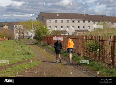 Drumchapel peripheral housing estate Glasgow Scotland sunny everyday scene with local teenage ...