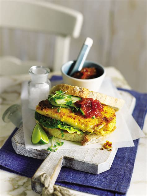 This quick crunchy fish burger recipe has a lightly spiced curry paste rub and zesty polenta ...