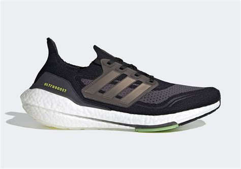 adidas Ultraboost 21 Core Black Solar Yellow FY0374 | SneakerNews.com