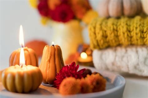 Premium Photo | Cozy autumn mood flowers and candles