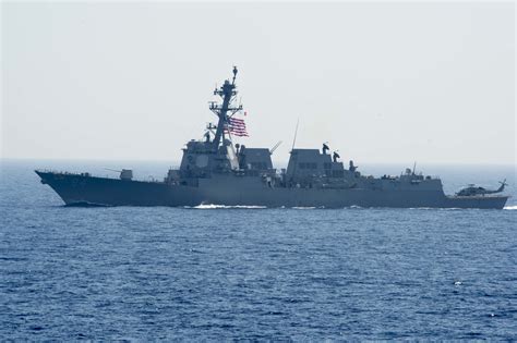 Official: Iranian vessels harassed destroyer in the Persian Gulf