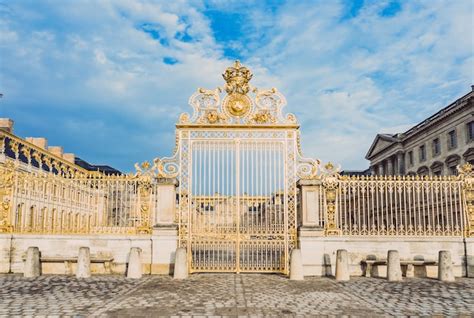 Premium Photo | Main golden door in exterior facade of versailles ...