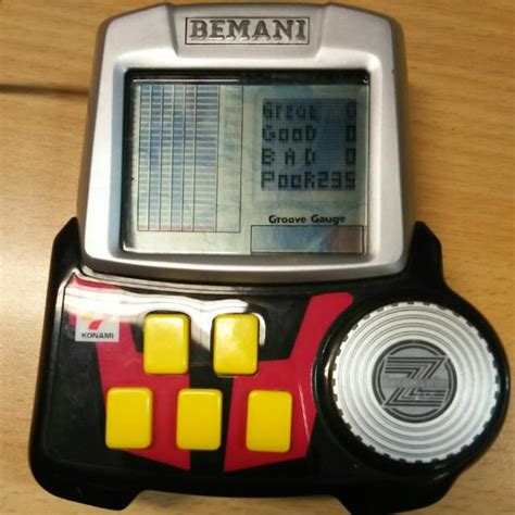 VINTAGE AND RARE! Konami Bemani Arcade Style Beatmania Handheld Game ...