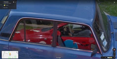 Google car and driver’s hands in reflection – StreetViewFun