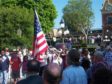 The Disneyland Color Guard lower the flags during the Memorial Day Flag Ceremony | Flickr ...