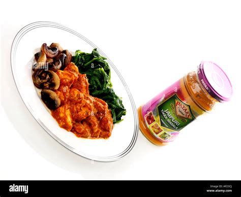 Chicken curry spinach mushrooms meal hi-res stock photography and ...