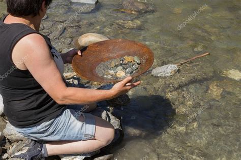 Gold Nugget mining from the River — Stock Photo © Luftklick #113218422