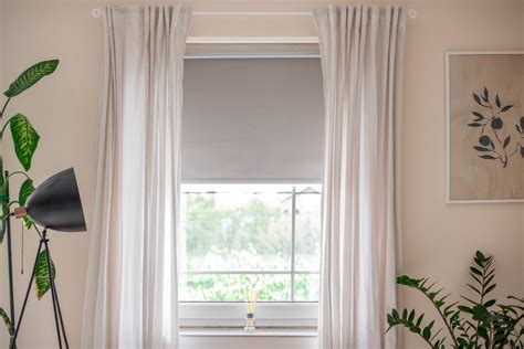 How to Hang Curtains Over Blinds