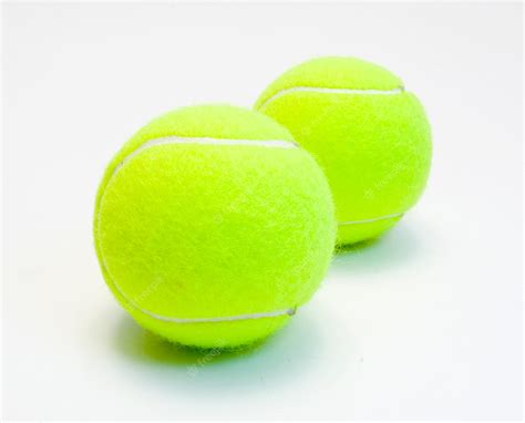 Premium Photo | Tennis balls isolated on white