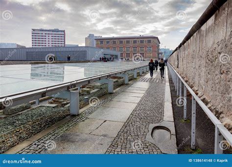 BERLIN, GERMANY - DEC 1, 2018: Iron Curtain - the Berlin Wall, Topography of Terror and Check ...