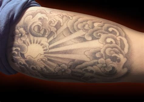 Tattoo Clouds And Sun Rays - Tattoo Mastery Academy