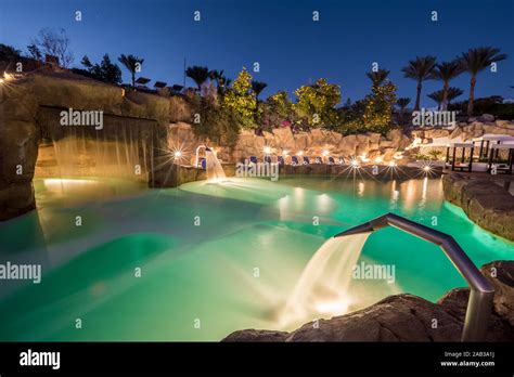 Evening view for luxury swimming pool in night illumination Stock Photo ...