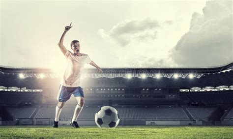 Soccer forward player stock image. Image of field, people - 72390363