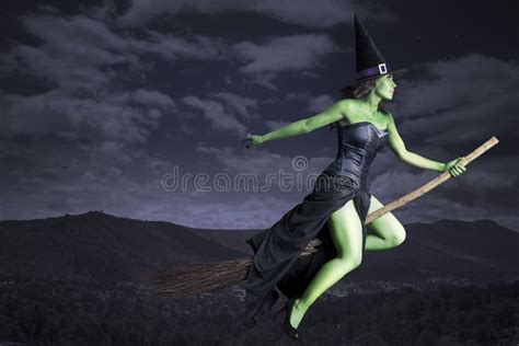 Halloween Witch Flying on Broomstick Stock Photo - Image of beautiful ...