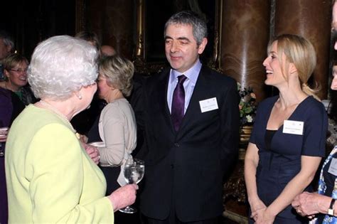 The Queen meets Mr Bean: Stars gather at Buckingham Palace for Dickens ...