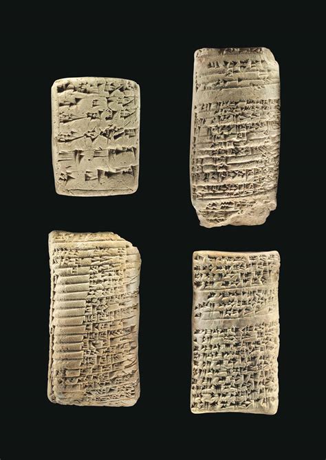 FOUR OLD BABYLONIAN CLAY CUNEIFORM TABLETS