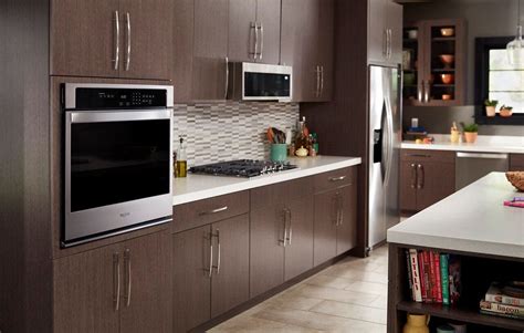 Whirlpool 1.1 Cu. Ft. Low Profile Over-the-Range Microwave Hood Combination Stainless steel ...