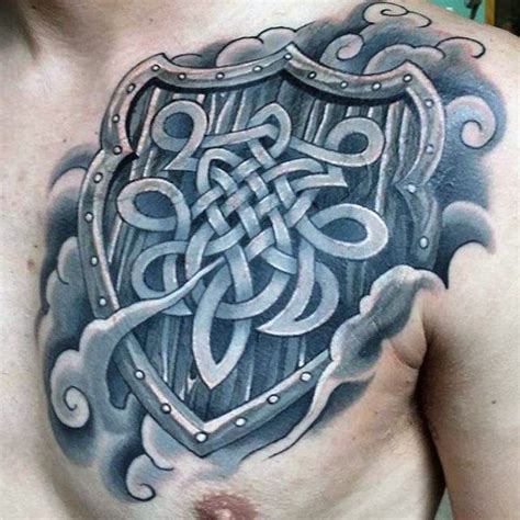 Shield With Celtic Knots And Clouds Mens Upper Chest Tattoos | Celtic ...