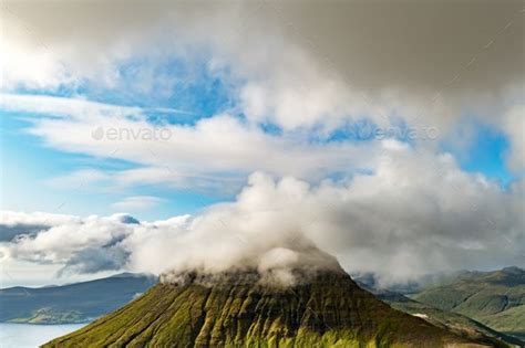 Foggy mountain peaks and clouds covering sea and mountains | Foggy mountains, Foggy, Clouds