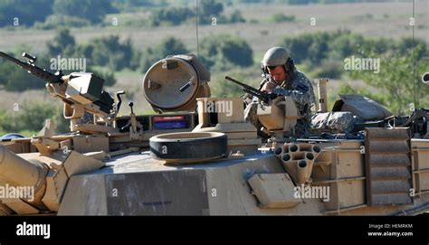 A Soldier with an M1A2 Abrams Tank crew and 3rd Battalion, 8th Stock ...