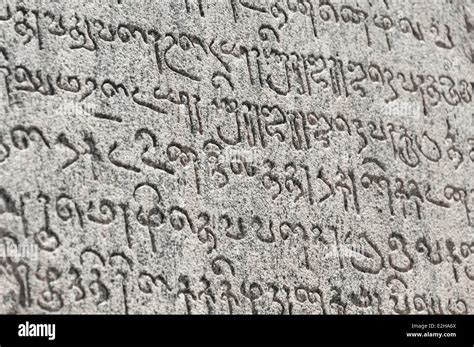 Indian inscriptions carved into a temple wall, Brihadeeswarar Temple ...