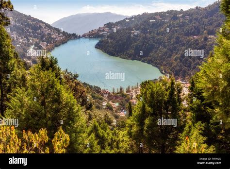 Aerial view of Nainital lake also known as the mango lake with Nainital ...