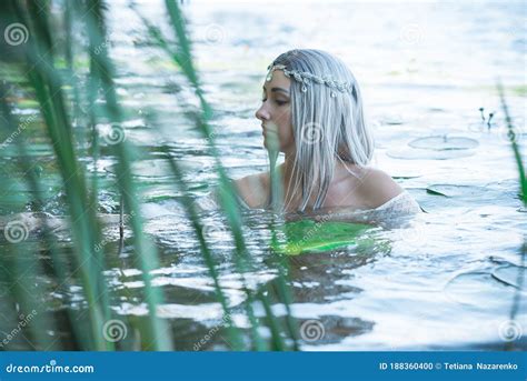 Pagan Rituals in Lake, Young Woman in White Stock Photo - Image of dress, holiday: 188360400